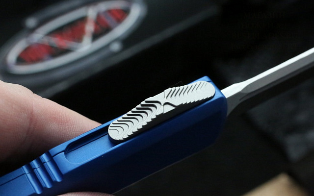 Нож Microtech Ultratech Satin 123-4BL с автоматическим открытием/закрытием клинка.
