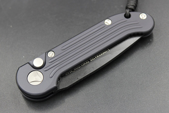 Нож Microtech LUDT 135-1 с автоматическим открытием клинка.